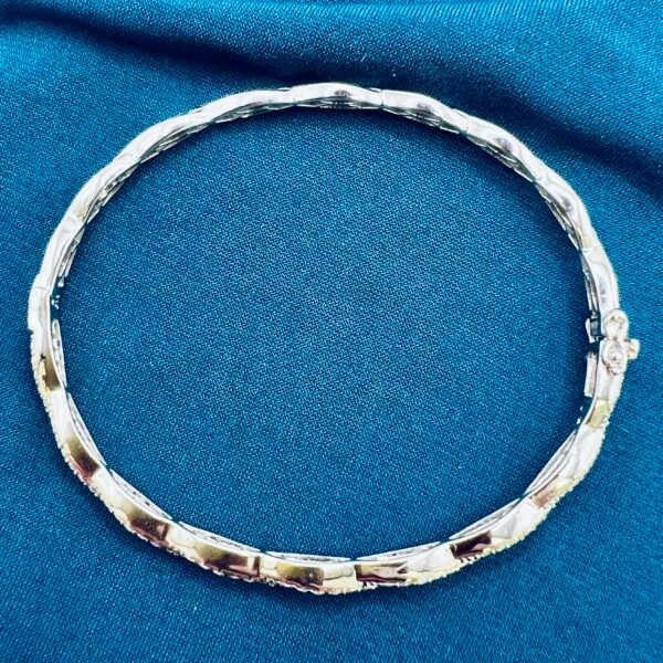 silver and rose gold bangle
